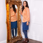 Woman in carey blouse little cub