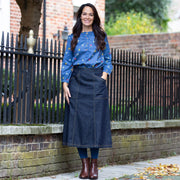 Woman in allington denim skirt