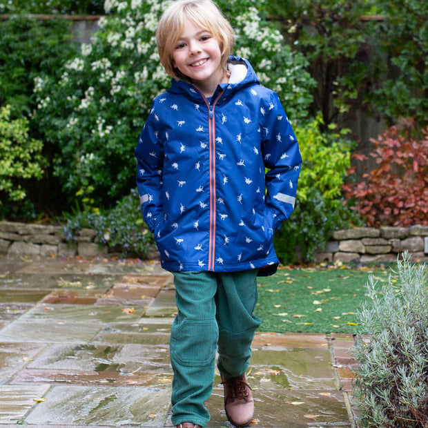 Boy in dino go coat