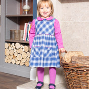 Girl in plaid dress set