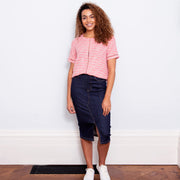 Woman in burstock blouse wavy daisy