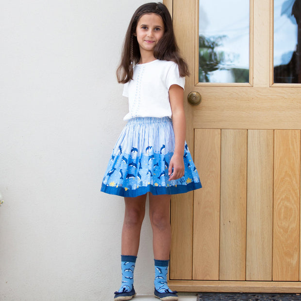 Girl in dolphin socks