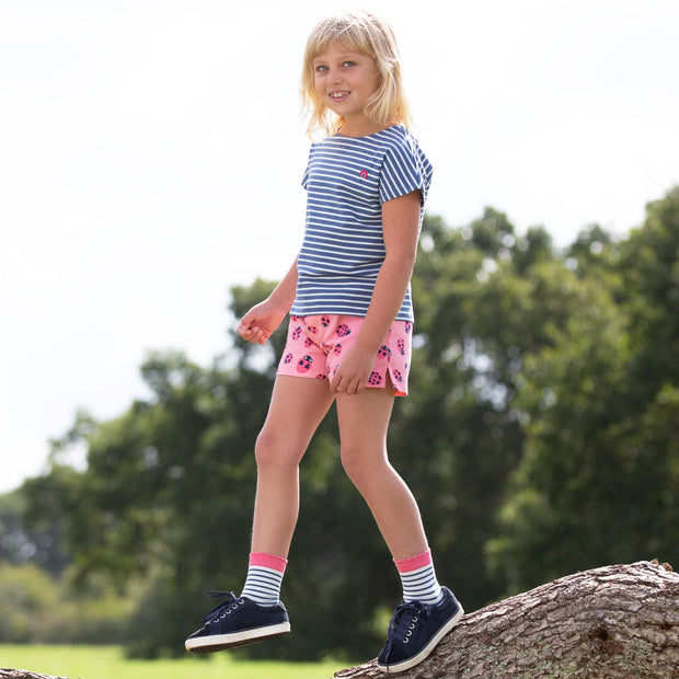 Girl in dolphin socks