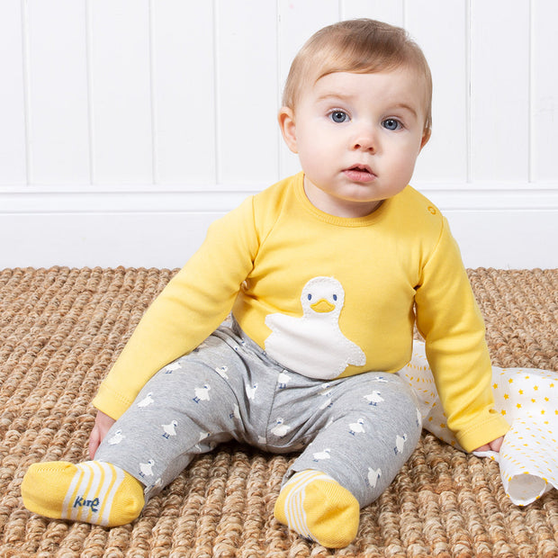 Baby in polka duck leggings