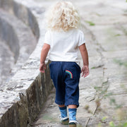 Girl in rainbow denim crops
