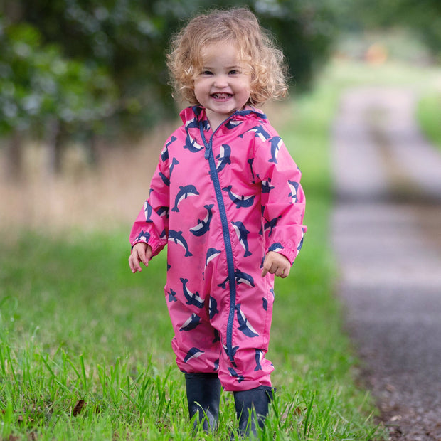 Girl in dolphin puddlepack suit