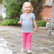 Girl in dolphin rainbow t-shirt