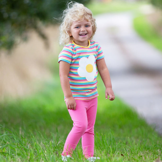 Girl in flower power t-shirt
