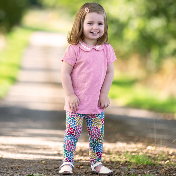 Girl in daisy collar top