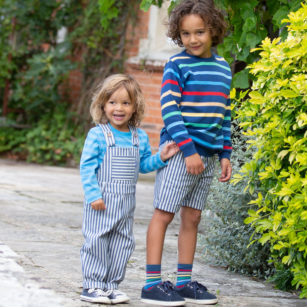 Boy in ticking turn-up shorts