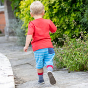 Boy in corfe shorts