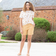 Woman in burstock blouse cat kingdom