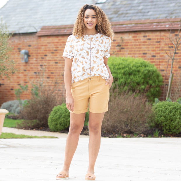 Woman in burstock blouse cat kingdom
