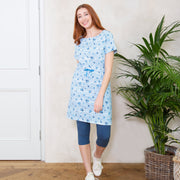 Woman in chine dress stripy ditsy