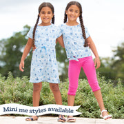 Woman in chine dress stripy ditsy