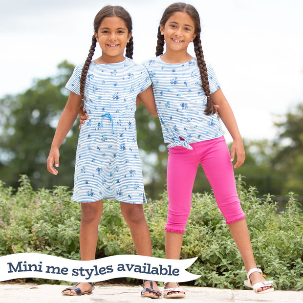 Woman in chine dress stripy ditsy