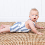 Baby in bay dungarees