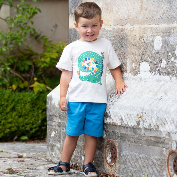 Boy in curly croc t-shirt