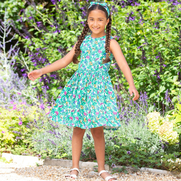 Girl in flutterby dress