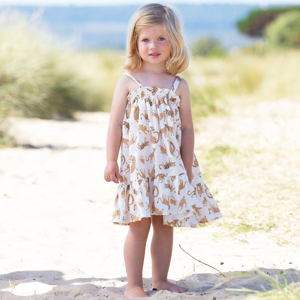 Girl in cat kingdom sundress