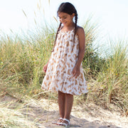 Girl in cat kingdom sundress