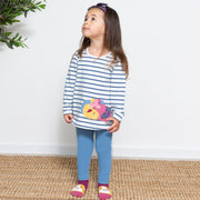 Girl in hoppity grippy socks