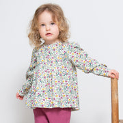 Girl in prairie blouse