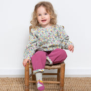 Girl in prairie blouse