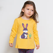 Girl in hoppity skip tunic