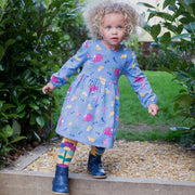 Girl in animal ramble dress