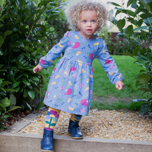 Girl in animal ramble dress