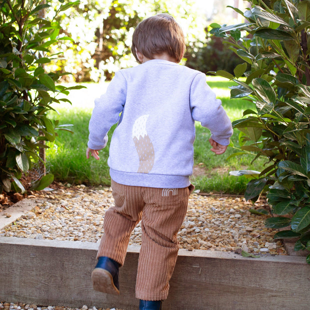 Boy in jumbo cord pull ups