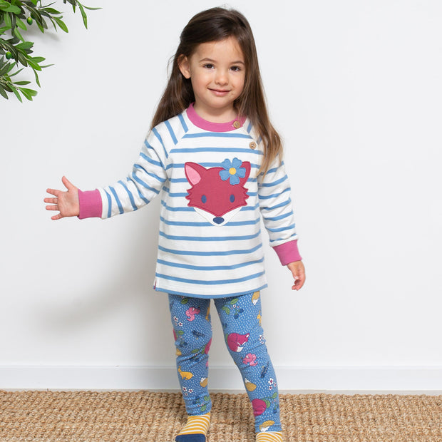 Girl in foxy flower sweatshirt