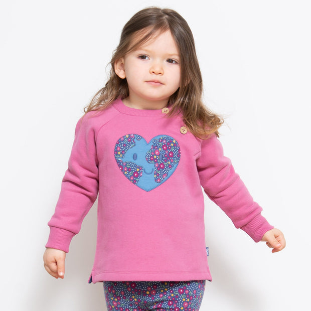 Girl in planet love sweatshirt