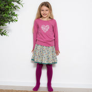 Girl in ditsy heart t-shirt