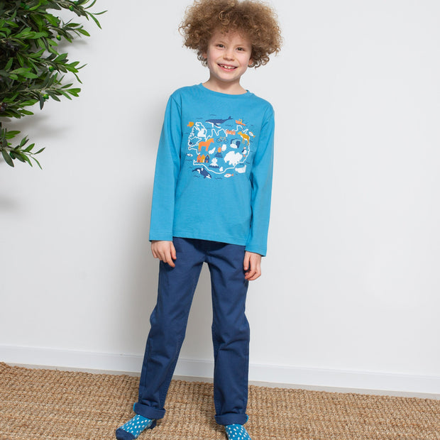 Boy in little dragon socks