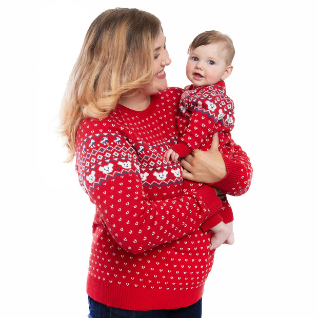 Baby in fair isle knit romper