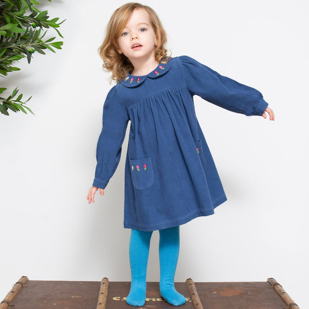 Girl in pretty pansy dress