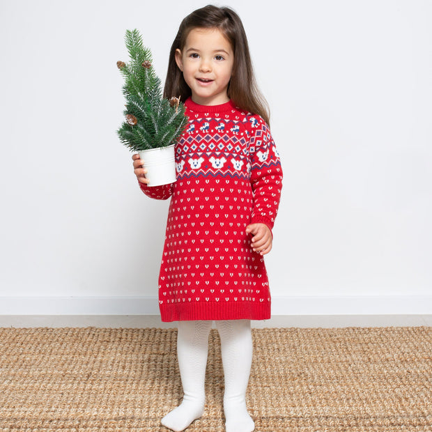 Girl in fair isle knit dress