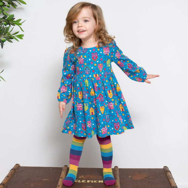 Girl in happy homes dress