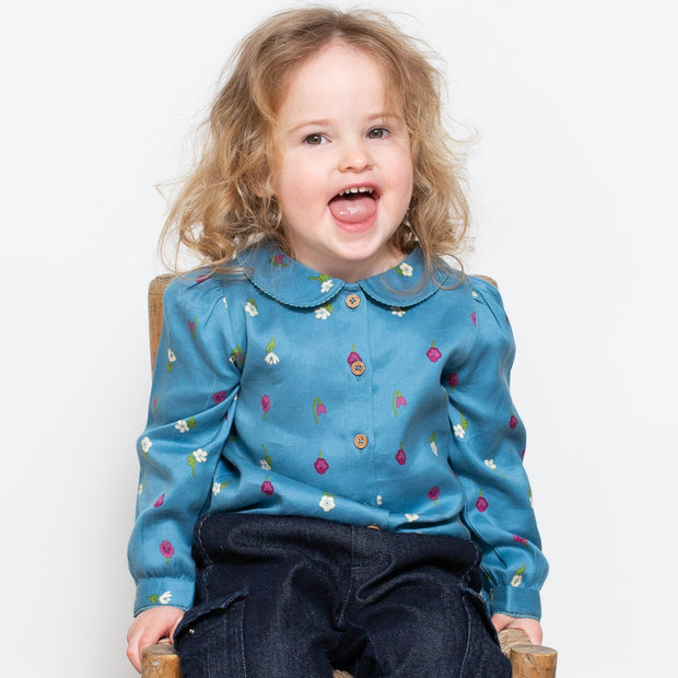 Girl in little flora blouse