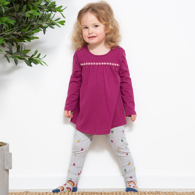 Girl in little flora leggings