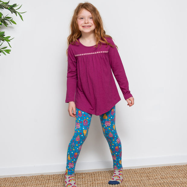 Girl in happy homes leggings