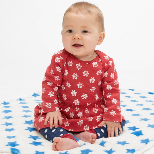 Baby in snowflake body dress