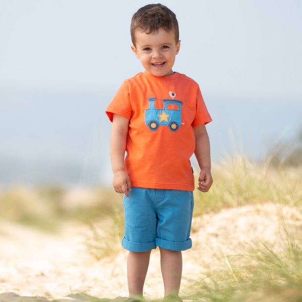 Boy in mini yacht shorts azure