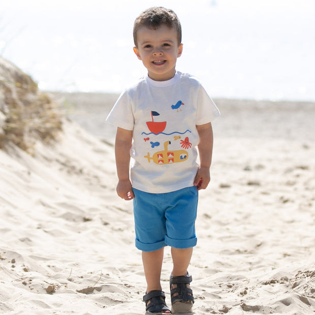 Boy in mini yacht shorts azure