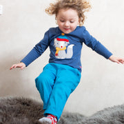 Boy in jean pull ups