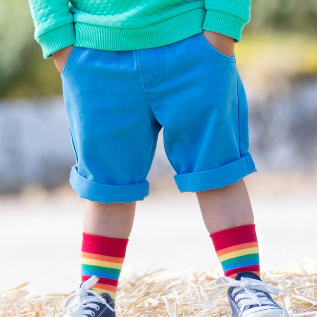 Boy in mini yacht shorts