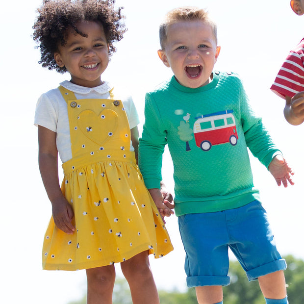 Boy in mini yacht shorts