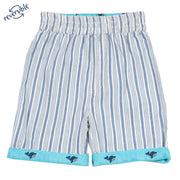 Boy in wonder whale shorts